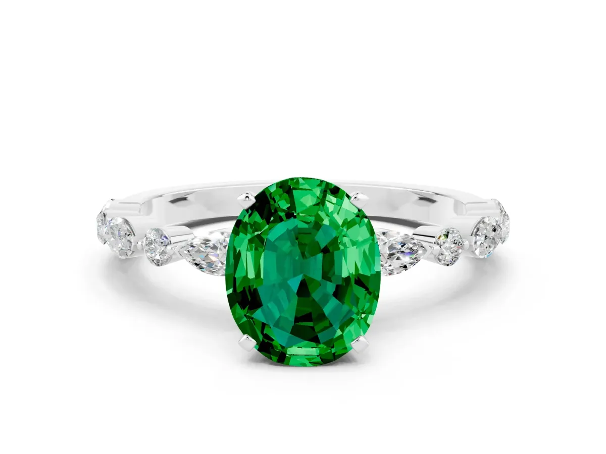 Oval Cut Emerald Ring with Marquise and Round Side Stones and Four-Prong Setting Silver