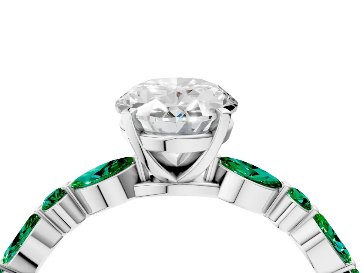Oval Cut Diamond Ring with Marquise and Round Emerald Side Stones and Four-Prong Setting White gold
