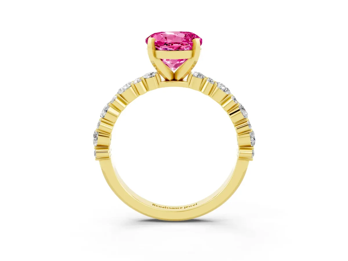Round Cut Pink Sapphire Side Stone Solitaire Ring with Round and Four-Prong Setting Yellow gold