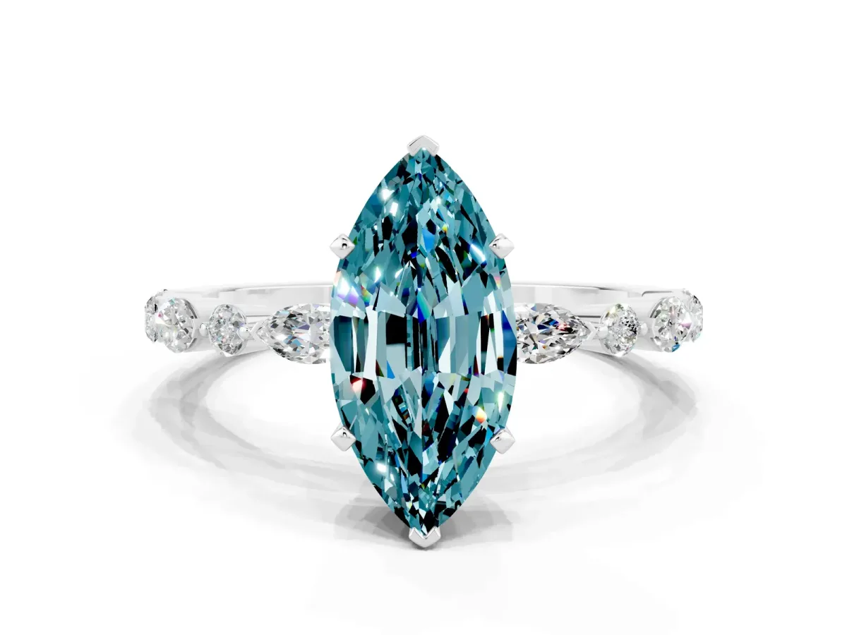 Marquise Cut Blue Topaz Ring with Marquise and Round Side Stones and Four-Prong Setting Silver