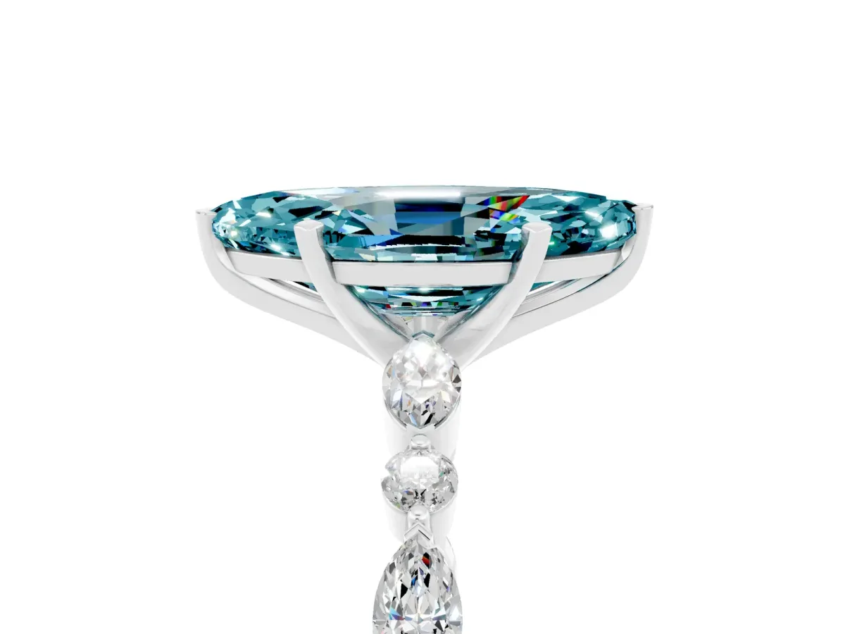 Marquise Cut Blue Topaz Ring with Marquise and Round Side Stones and Four-Prong Setting Silver