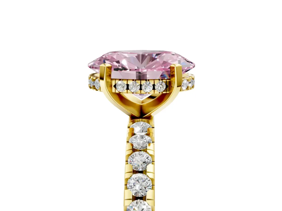 Fancy Pink Oval Cut Diamond Solitaire Ring with Round Pavé Band and Four-Prong Setting Yellow gold