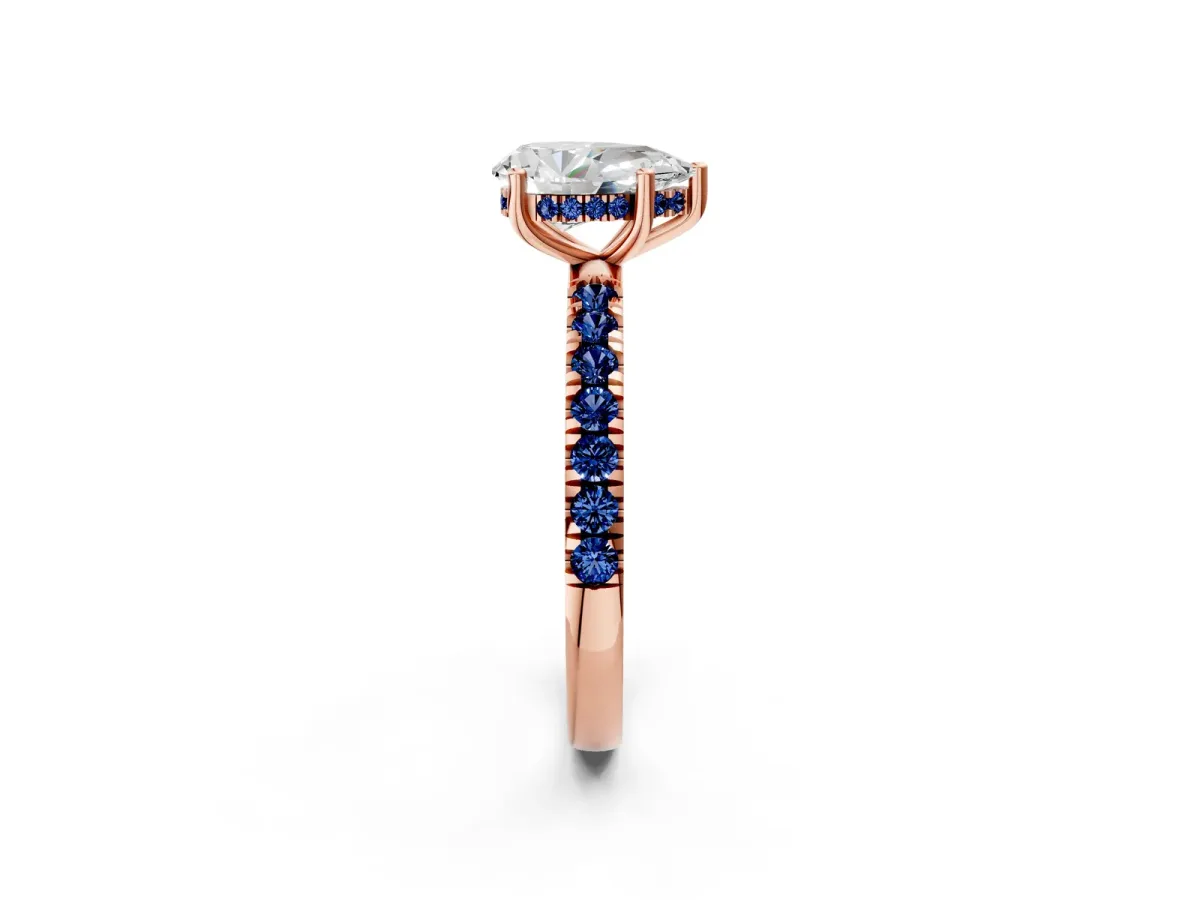 Pear Cut Diamond Pave Band Solitaire Ring with Round Blue Sapphire and Prong Setting Rose gold