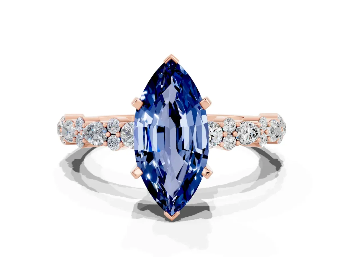 Marquise Cut Blue Sapphire Side Stone Solitaire Ring with Round and Four-Prong Setting Rose gold