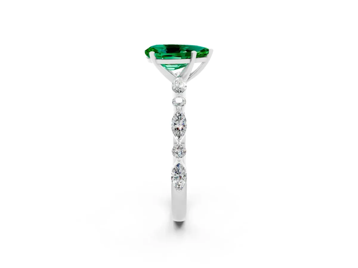 Pear Cut Emerald Ring with Marquise and Round Side Stones and Four-Prong Setting Platinum