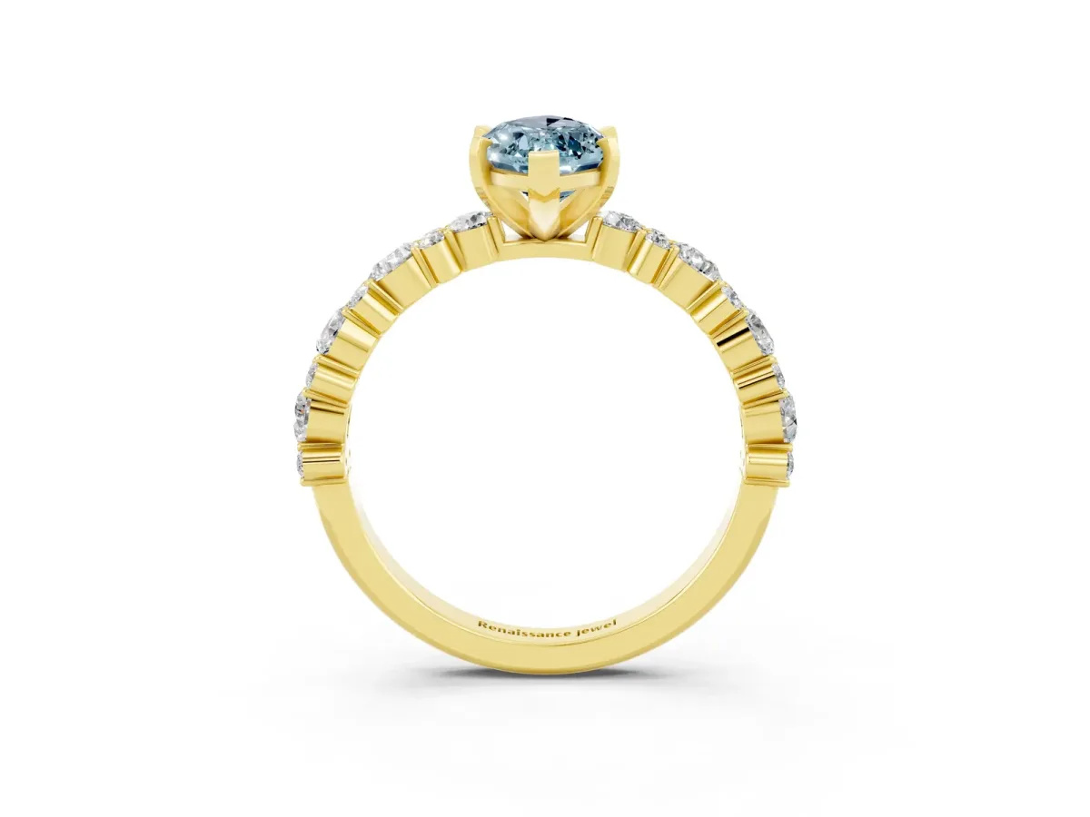 Marquise Cut Aquamarine Side Stone Solitaire Ring with Round and Four-Prong Setting Yellow gold