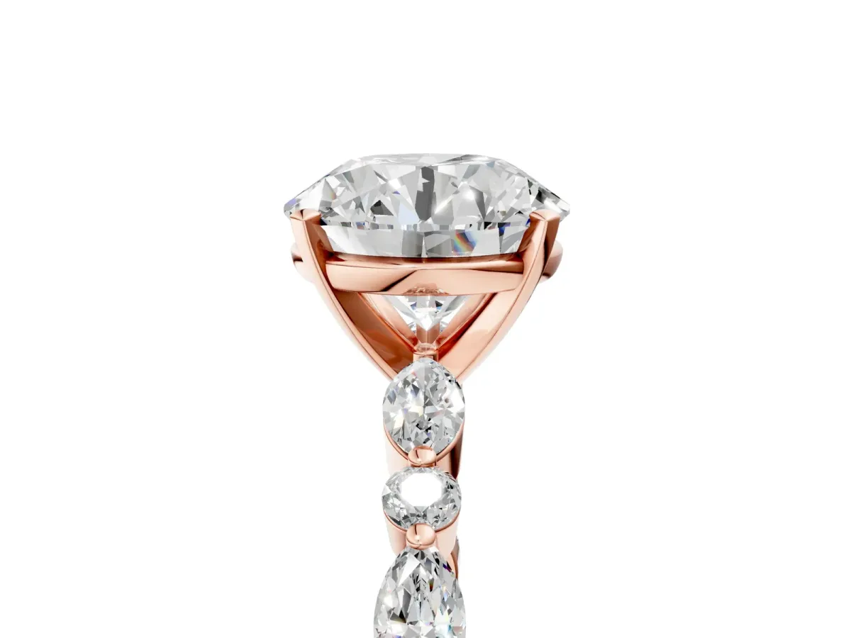 Round Cut Diamond Ring with Marquise and Round Side Stones and Four-Prong Setting Rose gold