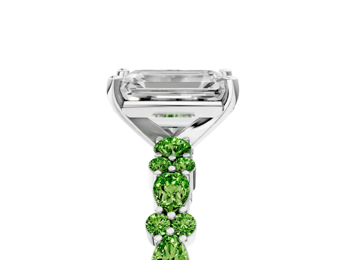 Emerald Cut Diamond Side Stone Solitaire Ring with Round Peridot and Four-Prong Setting Silver