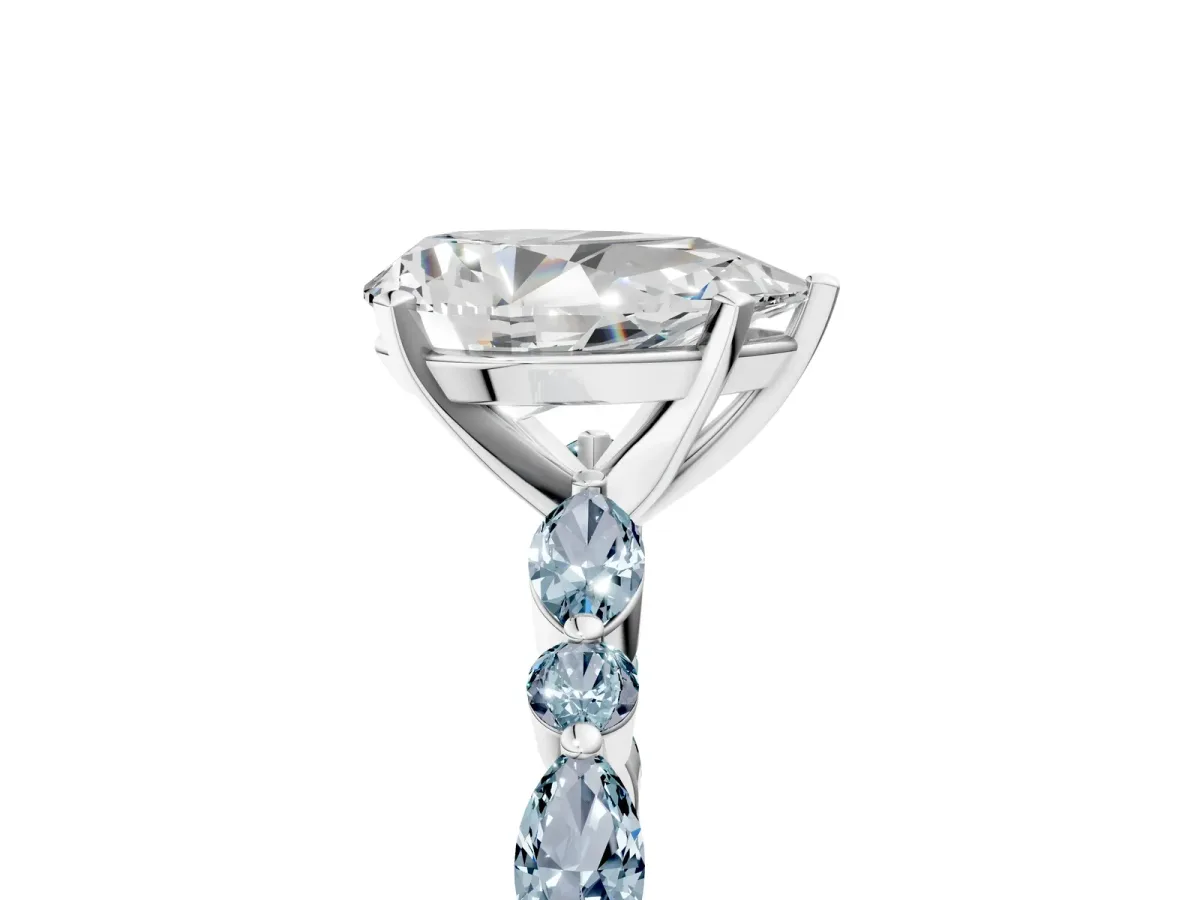 Pear Cut Diamond Ring with Marquise and Round Aquamarine Side Stones and Four-Prong Setting Silver