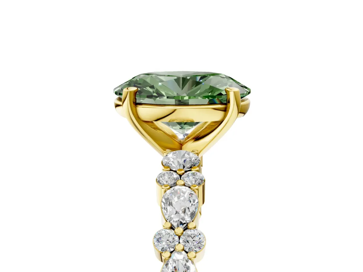 Fancy Green Oval Cut Diamond Side Stone Solitaire Ring with Round and Four-Prong Setting Yellow gold