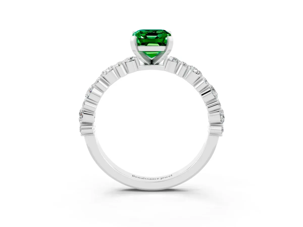 Emerald Cut Emerald Side Stone Solitaire Ring with Round and Four-Prong Setting Silver