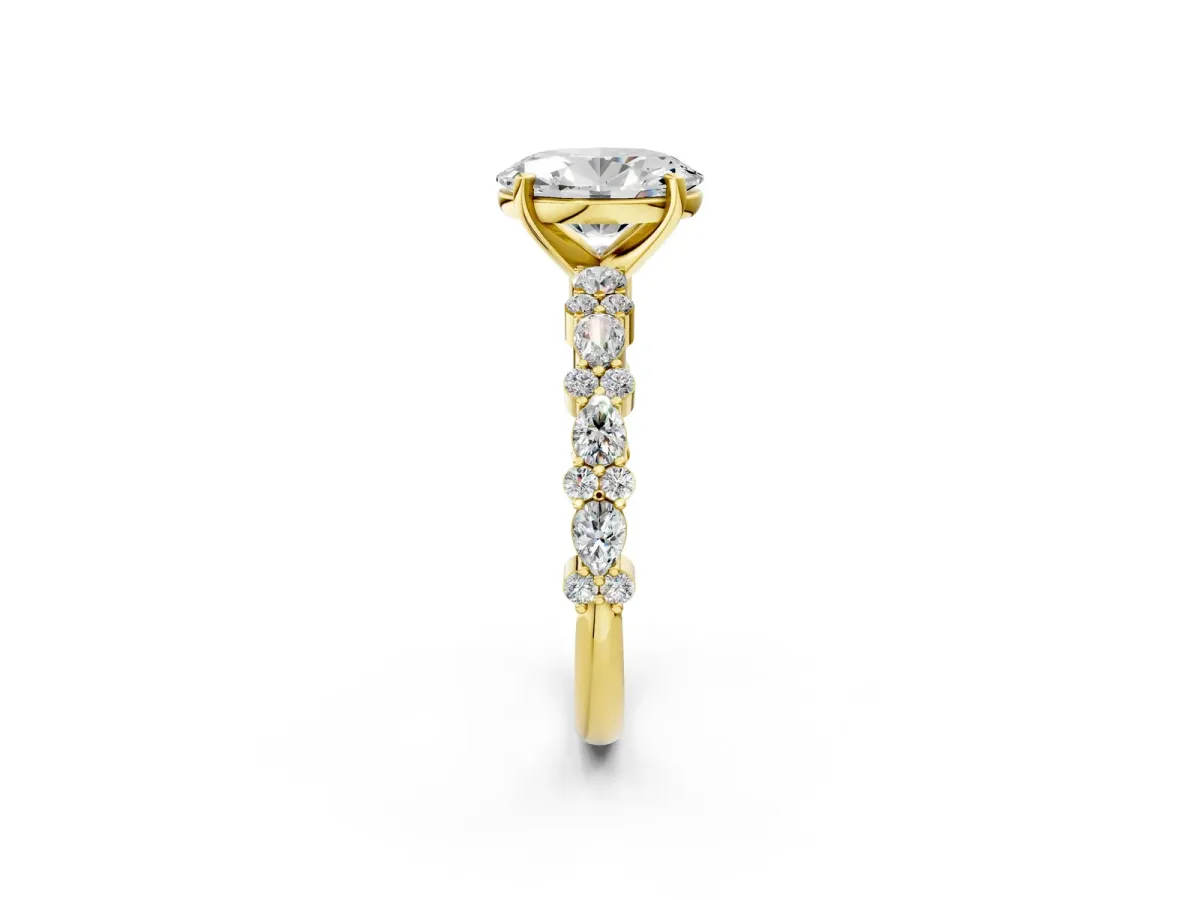 Oval Cut Diamond Side Stone Solitaire Ring with Round and Four-Prong Setting Yellow gold