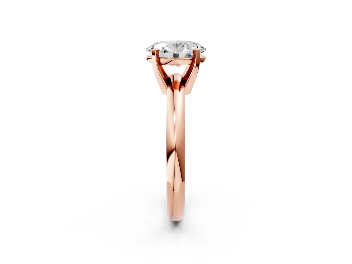 Oval Cut Diamond Solitaire Engagement Ring with Round Band and Four-Prong Setting Rose gold
