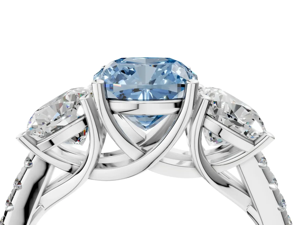 Fancy Blue Three-Stone Cushion Cut Diamond Ring with Round Pavé Band and Prong Setting White gold