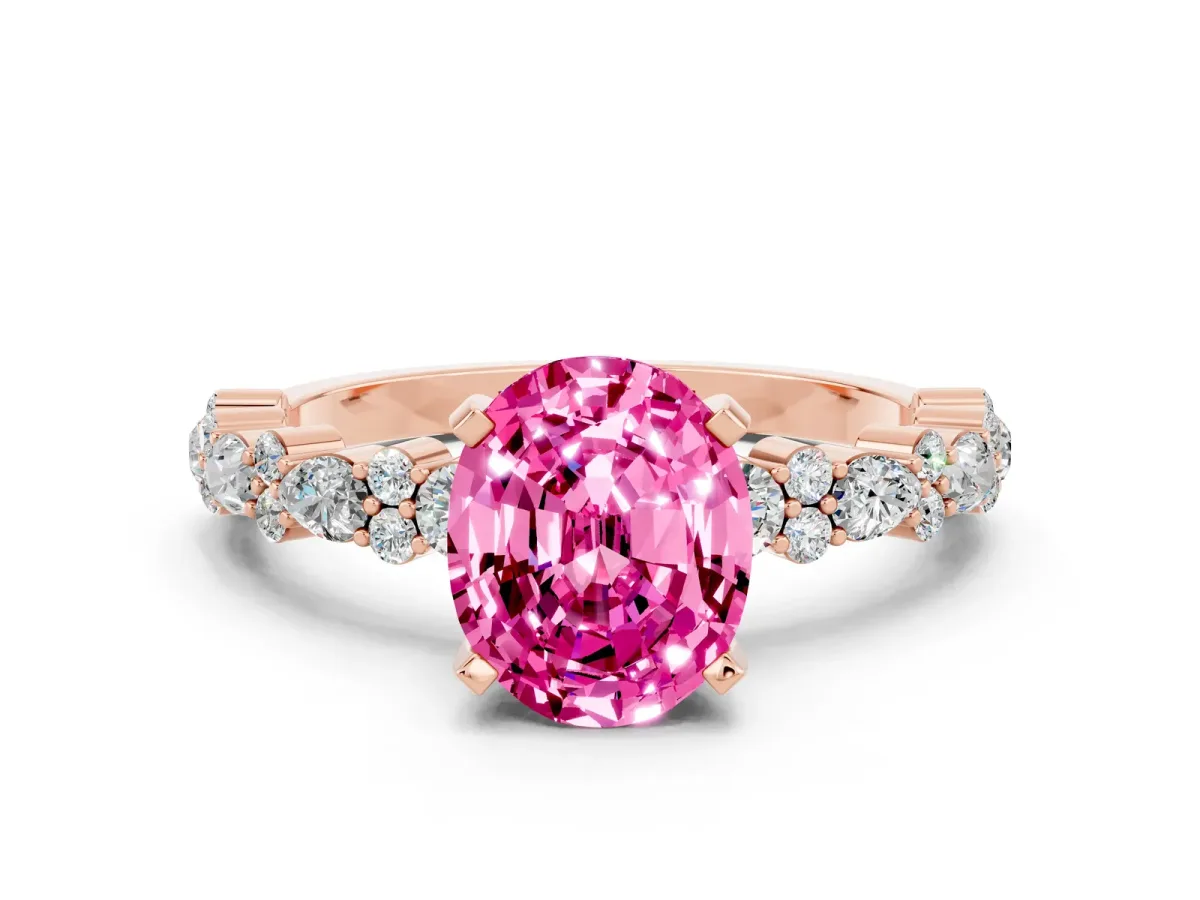 Oval Cut Pink Sapphire Side Stone Solitaire Ring with Round and Four-Prong Setting Rose gold