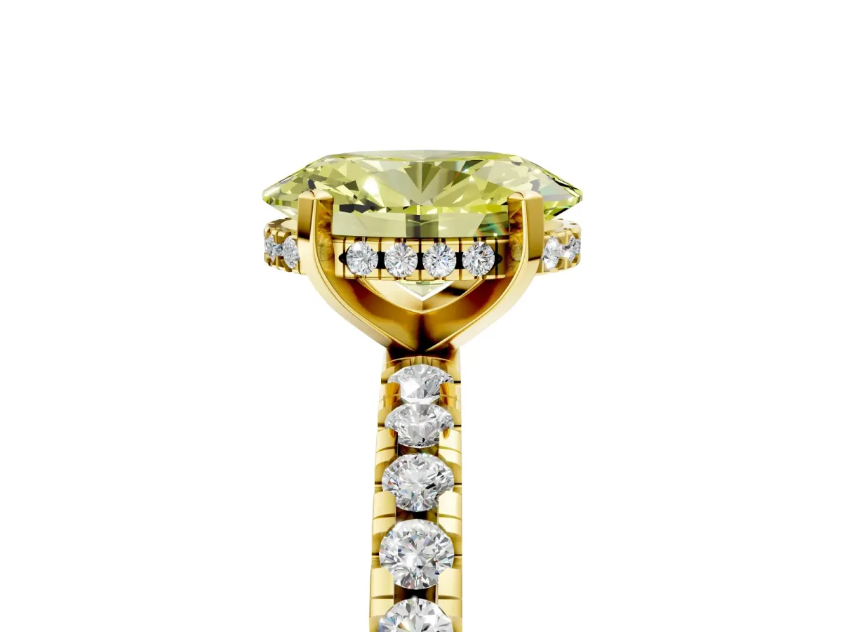 Fancy Yellow Oval Cut Diamond Solitaire Ring with Round Pavé Band and Four-Prong Setting Yellow gold