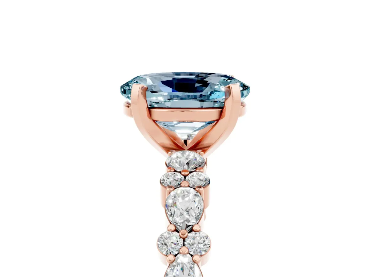 Oval Cut Aquamarine Side Stone Solitaire Ring with Round and Four-Prong Setting Rose gold