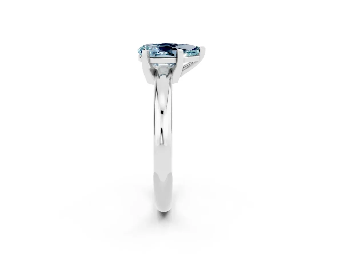 Pear Cut Aquamarine Solitaire Engagement Ring with Round Band and Four-Prong Setting Silver