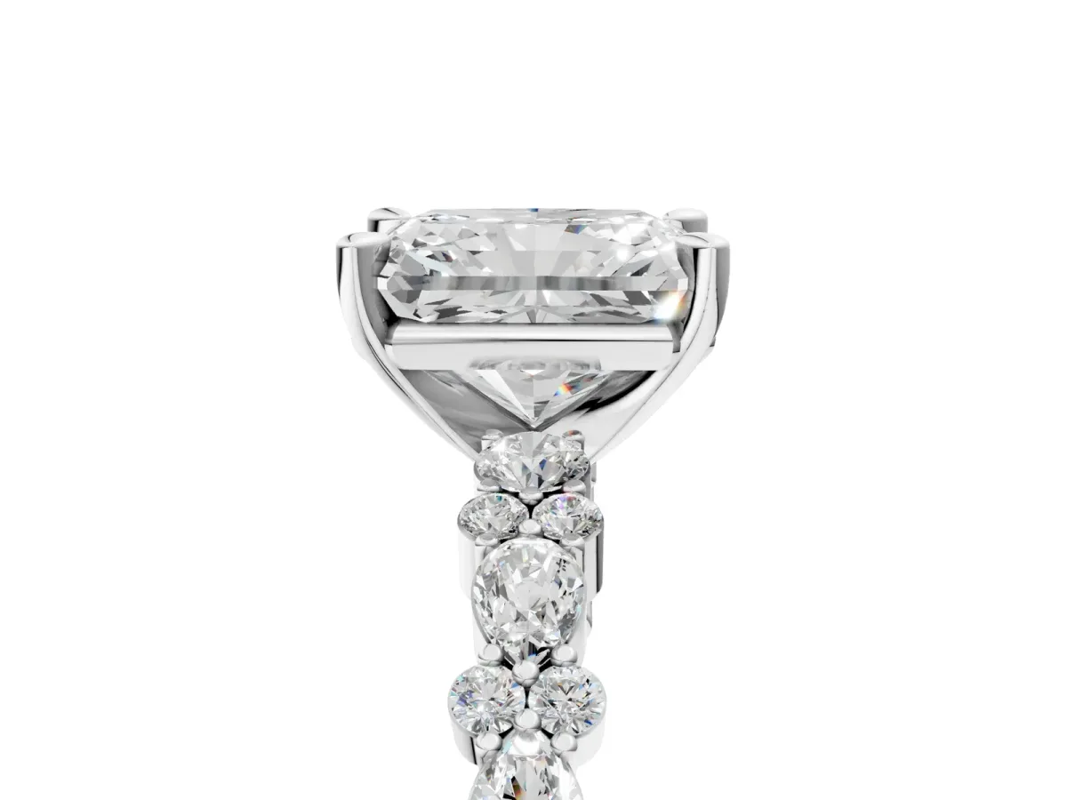 Radiant Cut Diamond Side Stone Solitaire Ring with Round and Four-Prong Setting Platinum