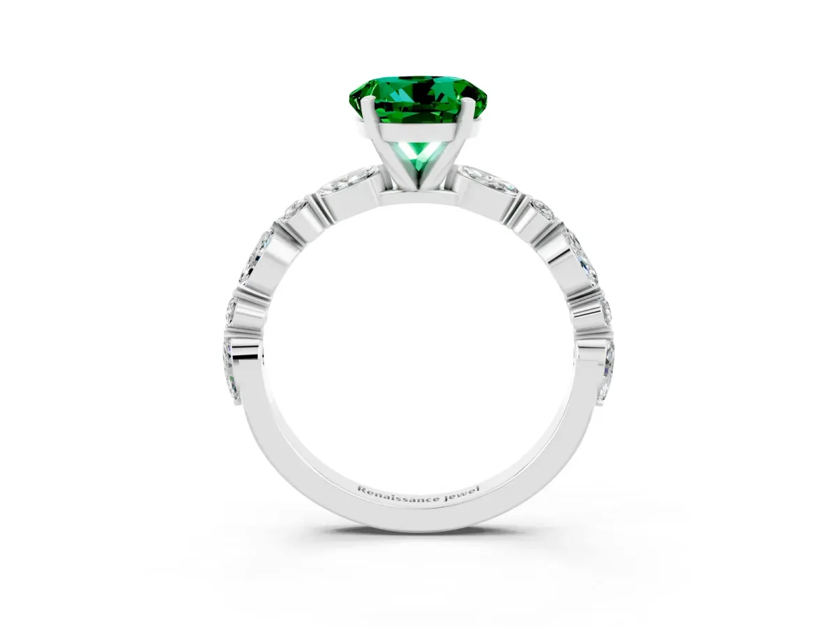 Round Cut Emerald Ring with Marquise and Round Side Stones and Four-Prong Setting Silver