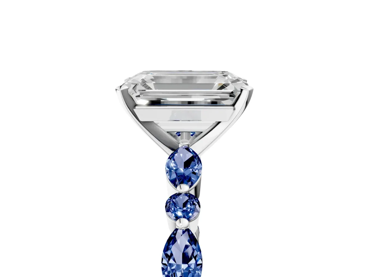 Emerald Cut Diamond Ring with Marquise and Round Blue Sapphire Side Stones and Four-Prong Setting Silver