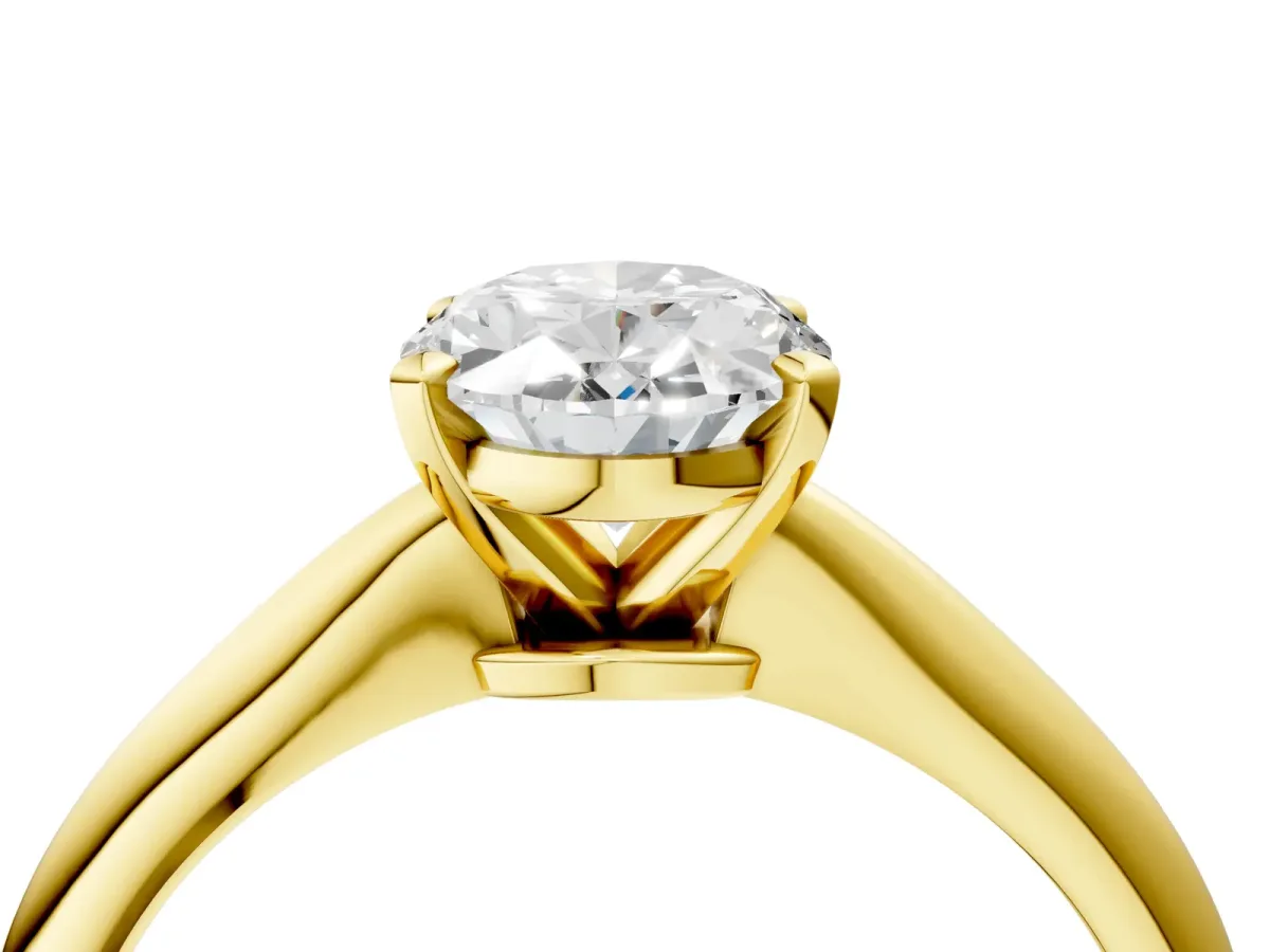 Oval Cut Diamond Solitaire Engagement Ring with Classic Band and Four-Prong Setting Yellow gold