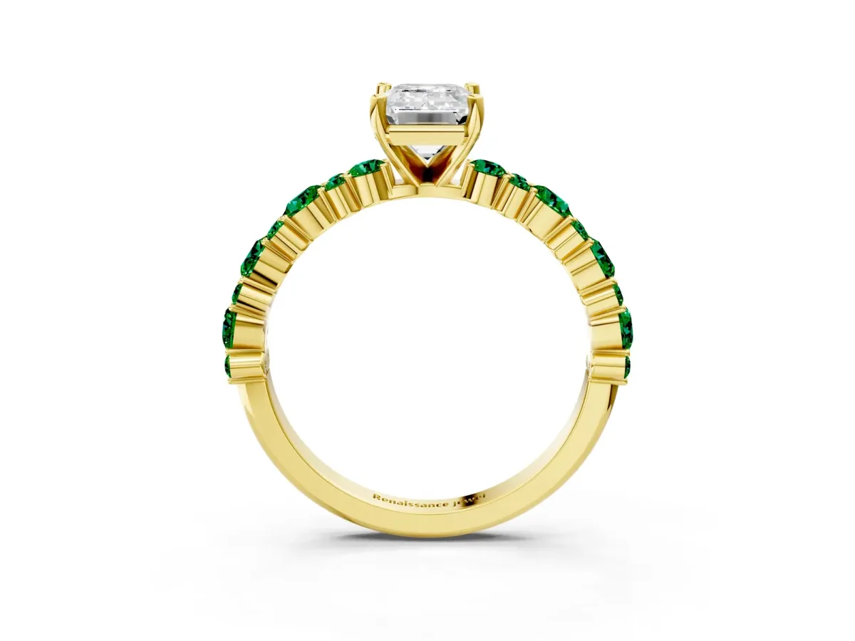 Emerald Cut Diamond Side Stone Solitaire Ring with Round Emerald and Four-Prong Setting Yellow gold