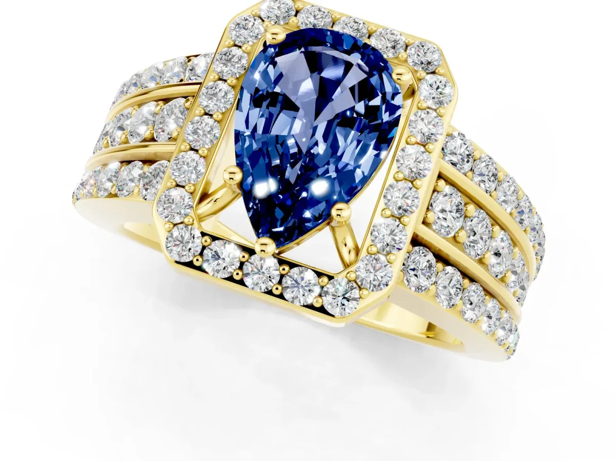 Pear Cut Halo Blue Sapphire Ring with Round Split Shank and Prong Setting Yellow gold