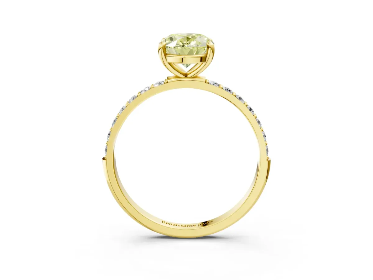 Fancy Yellow Oval Cut Diamond Solitaire Ring with Round Pavé Band and Prong Setting Yellow gold