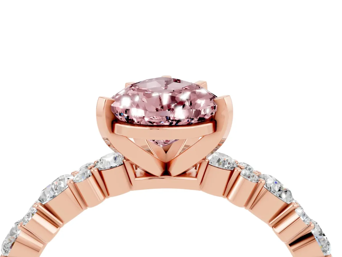 Pear Cut Morganite Side Stone Solitaire Ring with Round and Four-Prong Setting Rose gold