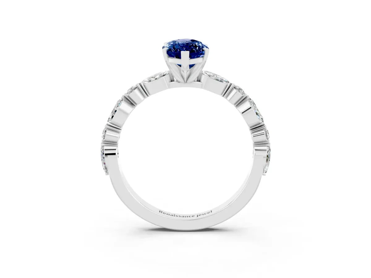 Marquise Cut Blue Sapphire Ring with Marquise and Round Side Stones and Four-Prong Setting Silver