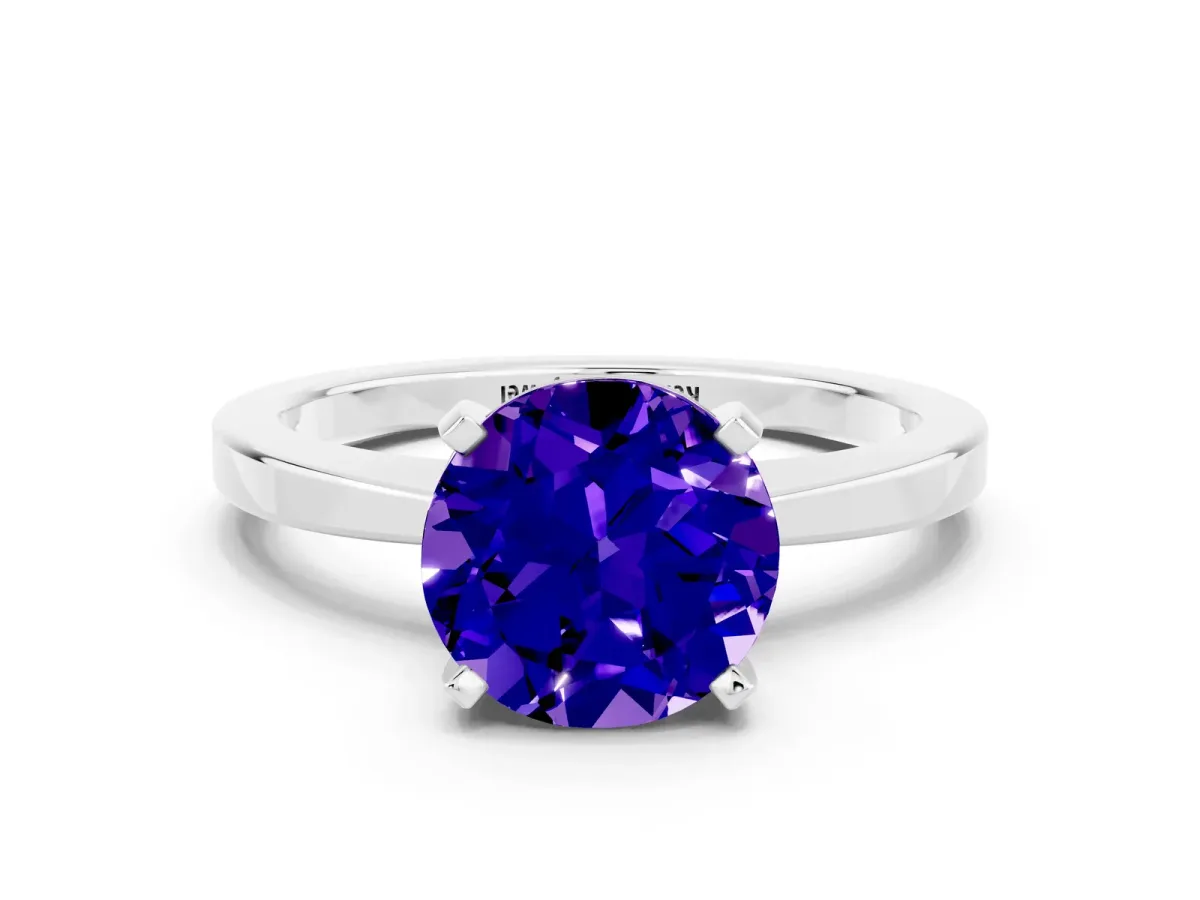 Round Cut Tanzanite Solitaire Engagement Ring with Classic Band and Four-Prong Setting Silver