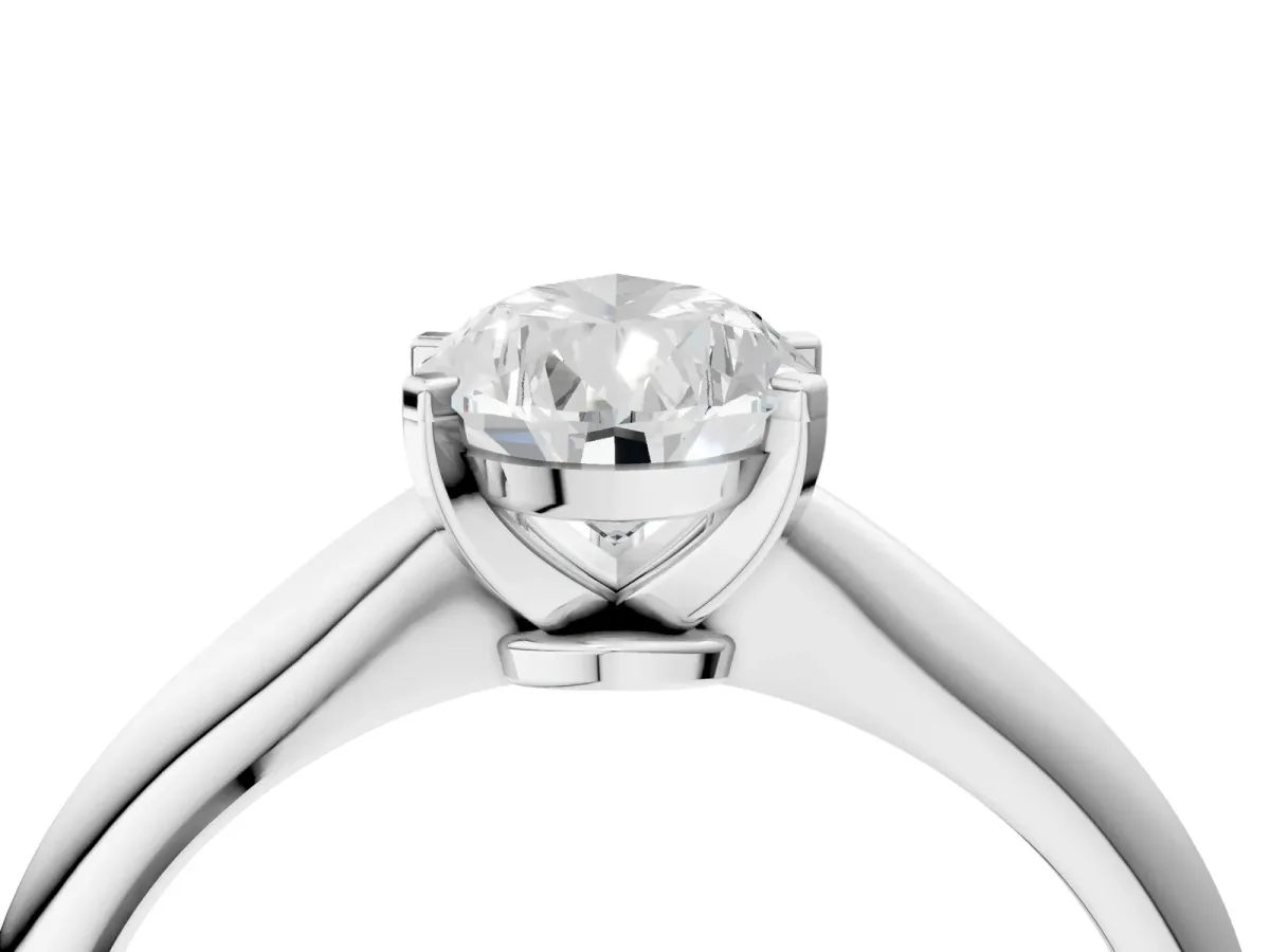 Pear Cut Diamond Solitaire Engagement Ring with Classic Band and Four-Prong Setting Silver