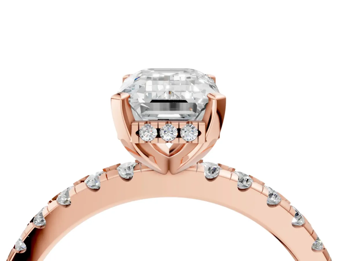 Emerald Cut Diamond Solitaire Ring with Round Pavé Band and Four-Prong Setting Rose gold