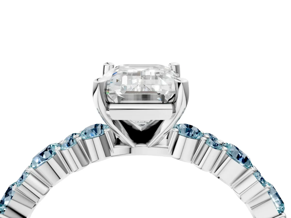 Emerald Cut Diamond Side Stone Solitaire Ring with Round Aquamarine and Four-Prong Setting Platinum