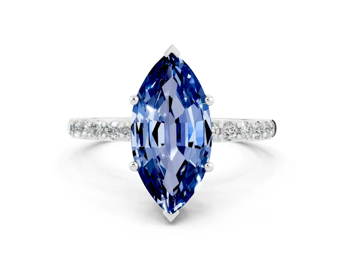 Marquise Cut Blue Sapphire Solitaire Ring with Round Pavé Band and Prong Setting Silver