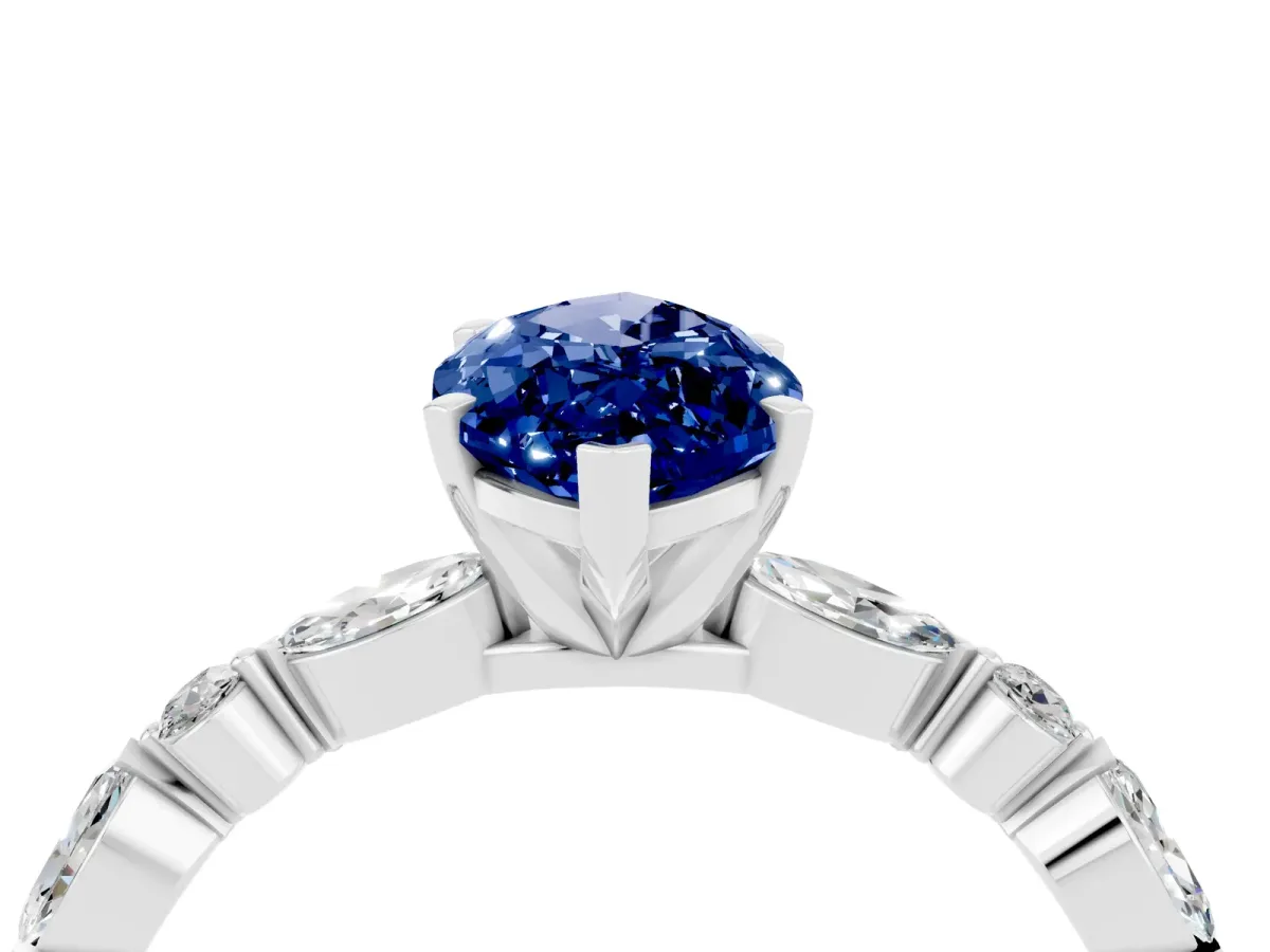Marquise Cut Blue Sapphire Ring with Marquise and Round Side Stones and Four-Prong Setting Silver