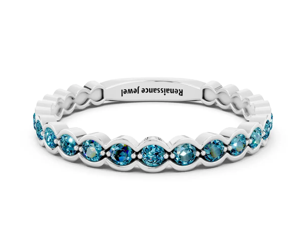 Round Blue Topaz Bezel Set Eternity Band White gold