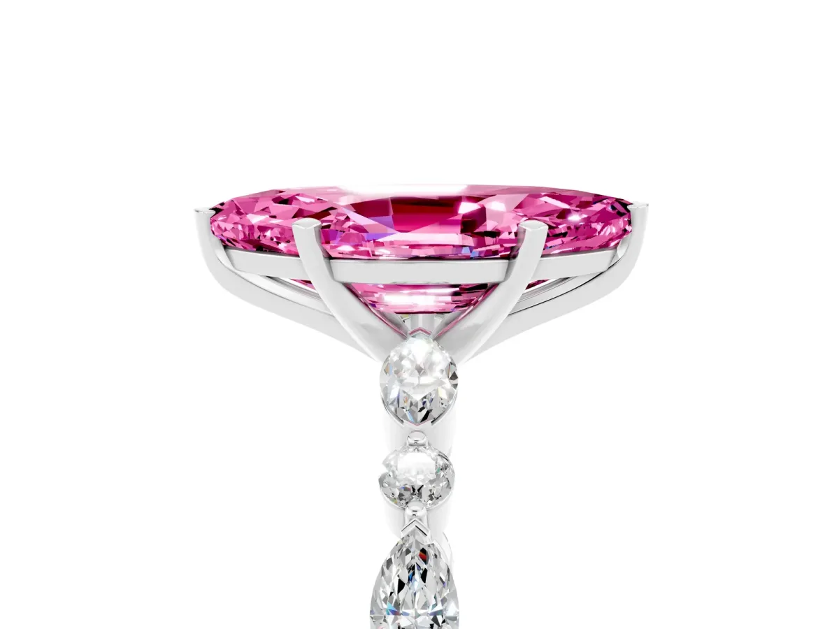 Marquise Cut Pink Sapphire Ring with Marquise and Round Side Stones and Four-Prong Setting Silver