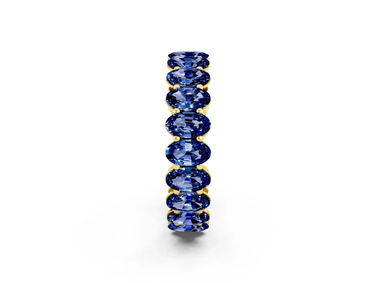 Oval Cut Blue Sapphire Eternity Band with Shared Prong Setting Yellow gold