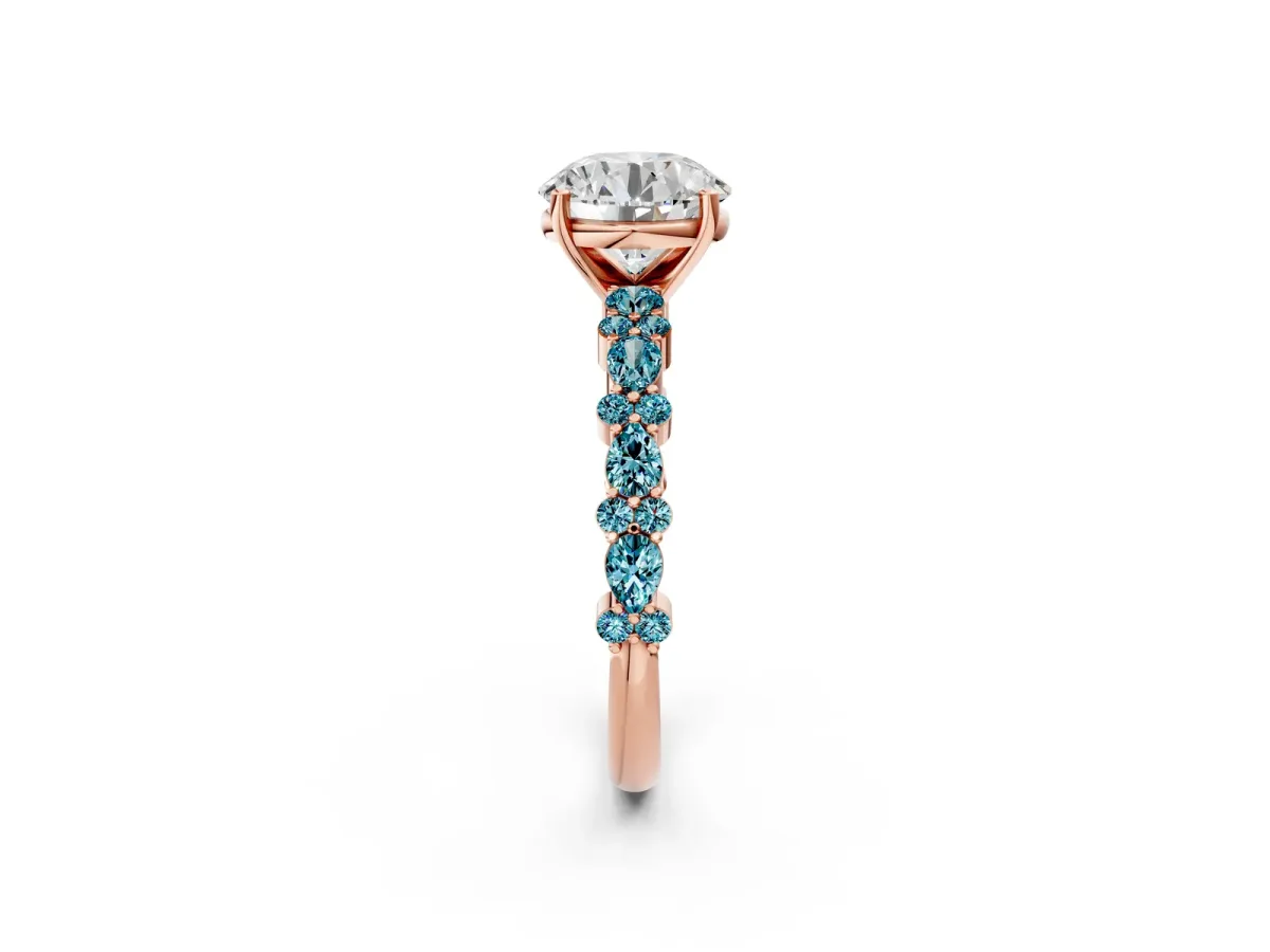 Round Cut Diamond Side Stone Solitaire Ring with Round Blue Topaz and Four-Prong Setting Rose gold