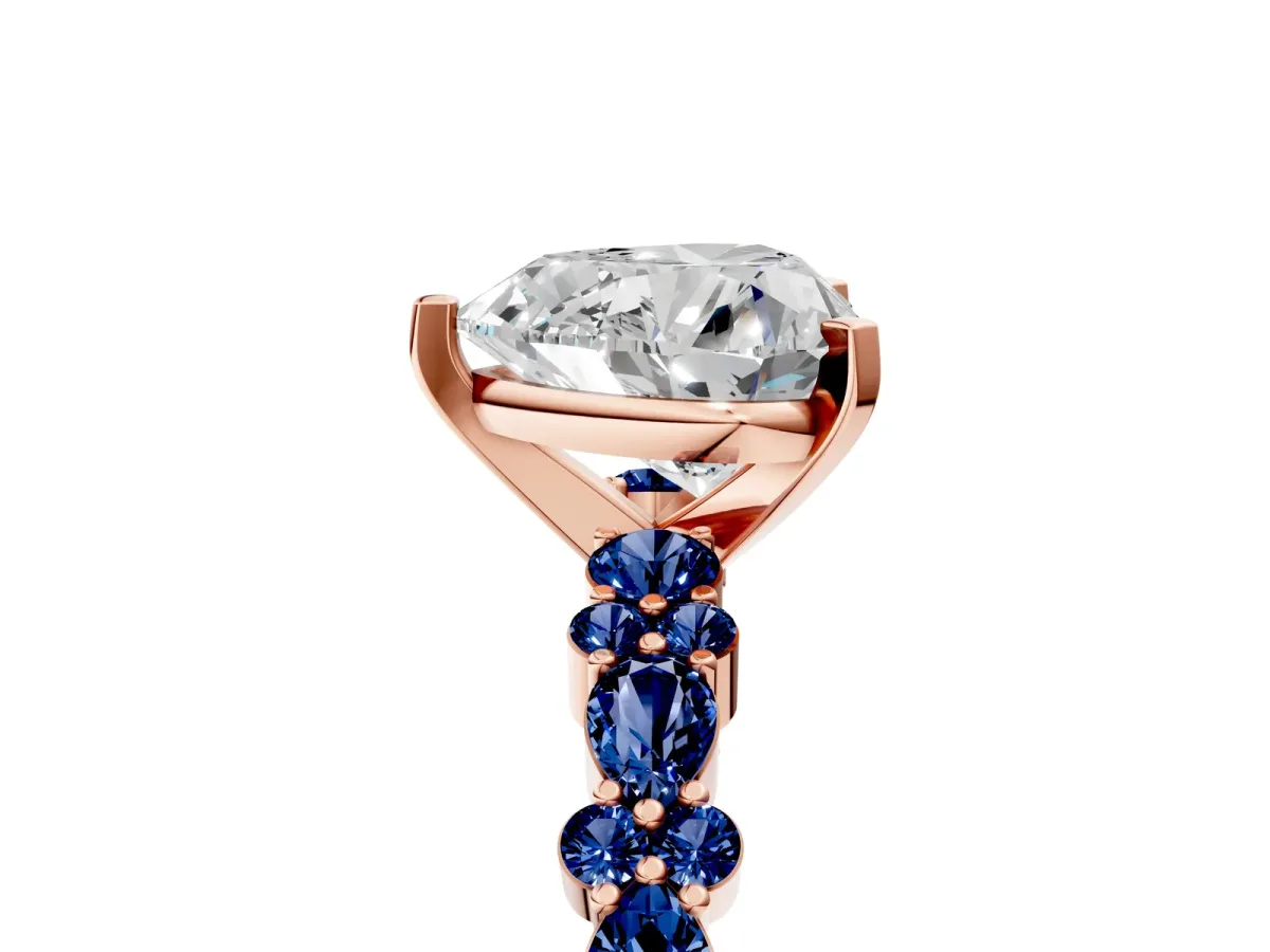 Heart Cut Diamond Side Stone Solitaire Ring with Round Blue Sapphire and Four-Prong Setting Rose gold