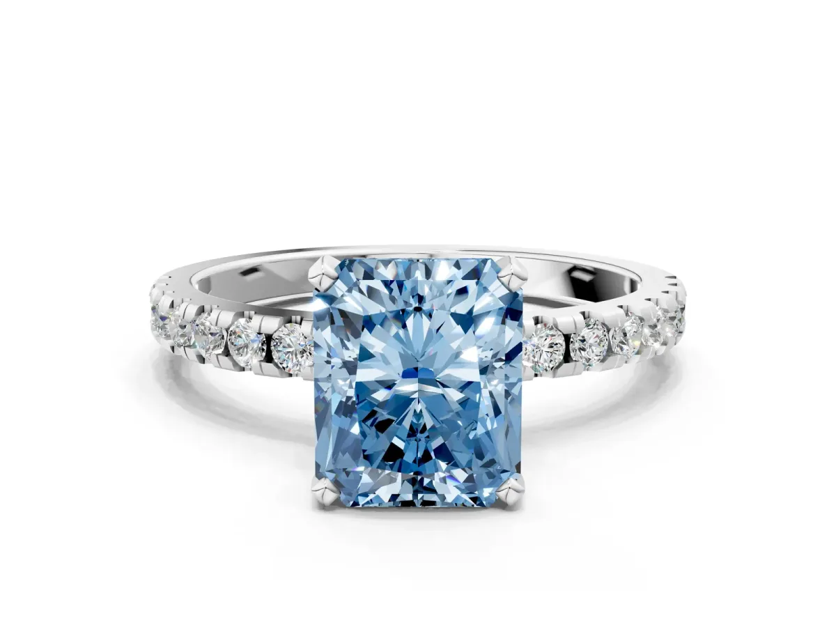 Fancy Blue Radiant Cut Diamond Solitaire Ring with Round Pavé Band and Four-Prong Setting Silver