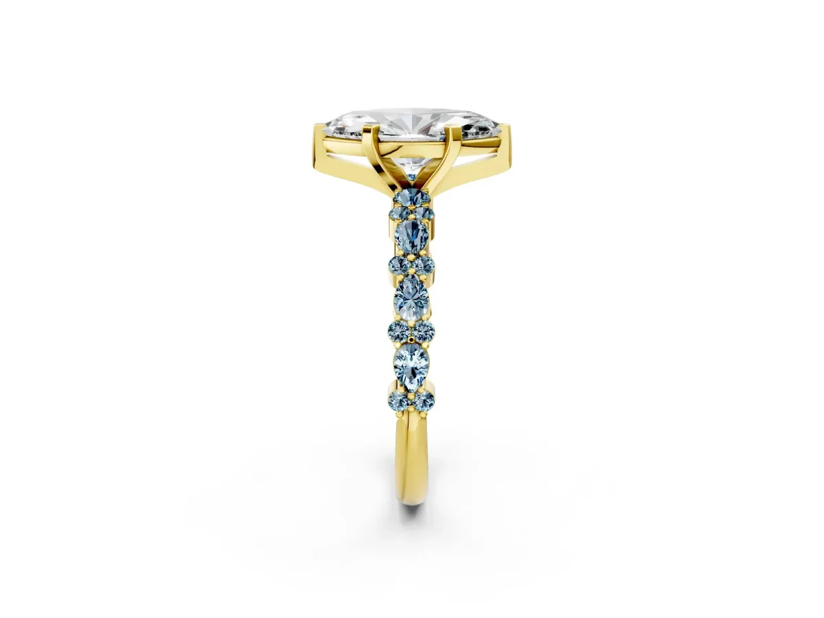 Marquise Cut Diamond Side Stone Solitaire Ring with Round Aquamarine and Four-Prong Setting Yellow gold