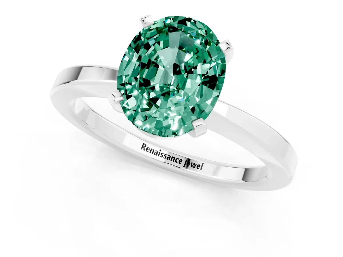 Oval Cut Green Sapphire Solitaire Engagement Ring with Classic Band and Four-Prong Setting Silver