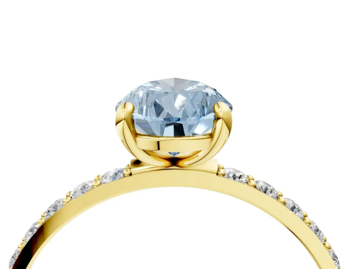 Fancy Blue Pear Cut Diamond Solitaire Ring with Round Pavé Band and Prong Setting Yellow gold