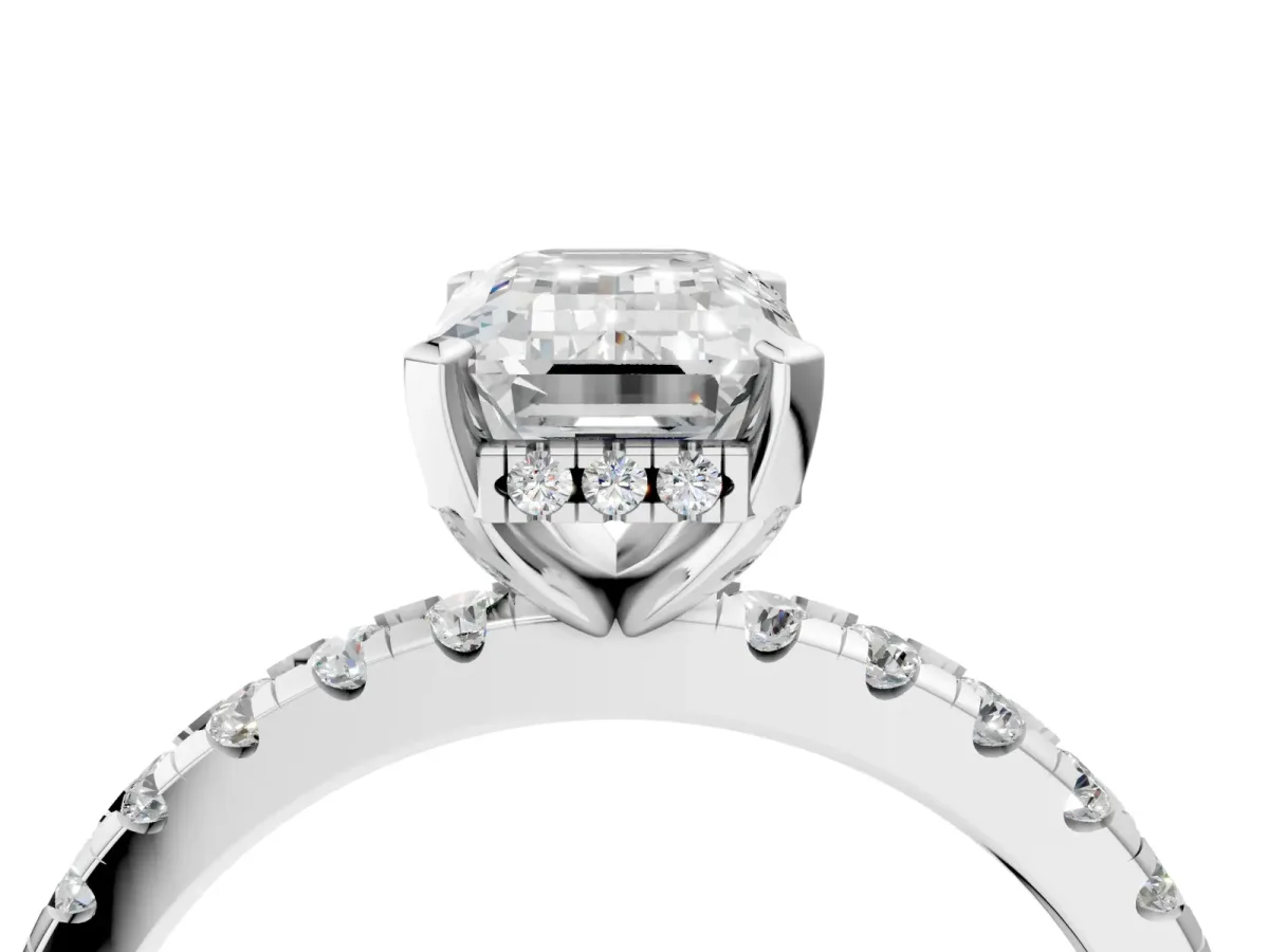Emerald Cut Diamond Solitaire Ring with Round Pavé Band and Four-Prong Setting Platinum