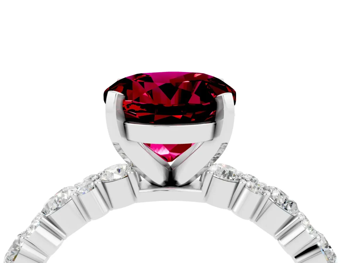 Round Cut Garnet Side Stone Solitaire Ring with Round and Four-Prong Setting Silver