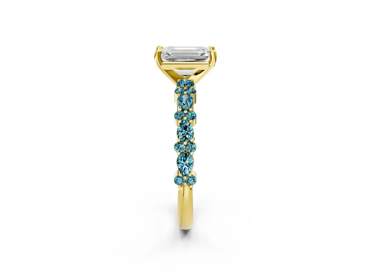 Emerald Cut Diamond Side Stone Solitaire Ring with Round Blue Topaz and Four-Prong Setting Yellow gold