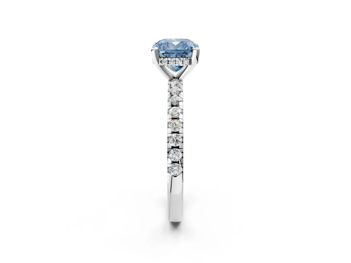 Fancy Blue Cushion Cut Diamond Solitaire Ring with Round Pavé Band and Four-Prong Setting Silver
